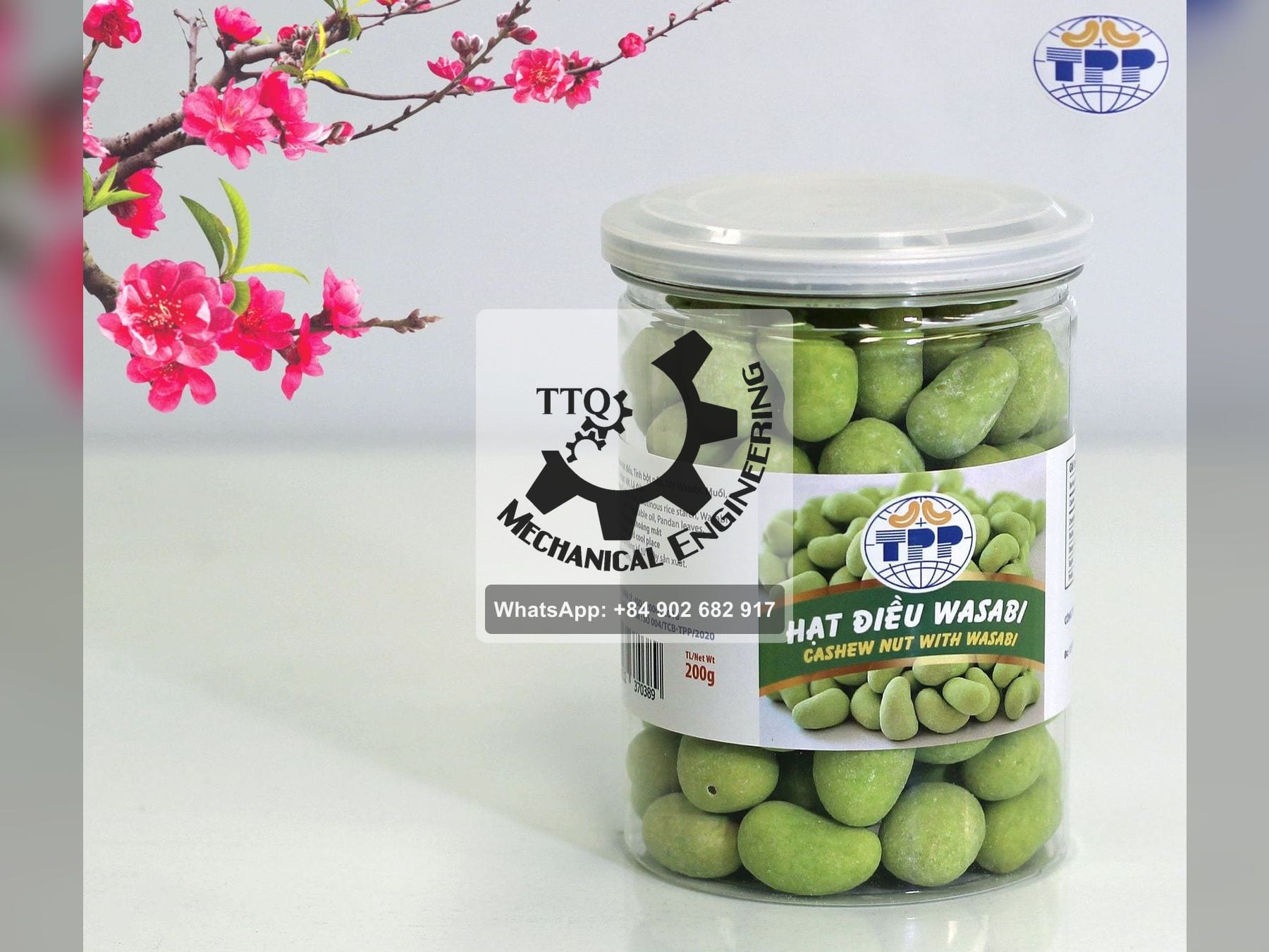 A 200 g retail jar of wasabi-coated cashew kernels, styled for a product photograph
