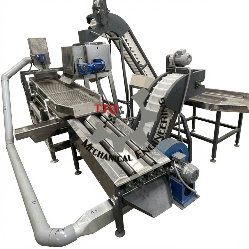 A complete TTQ automatic cashew shelling line photographed on white