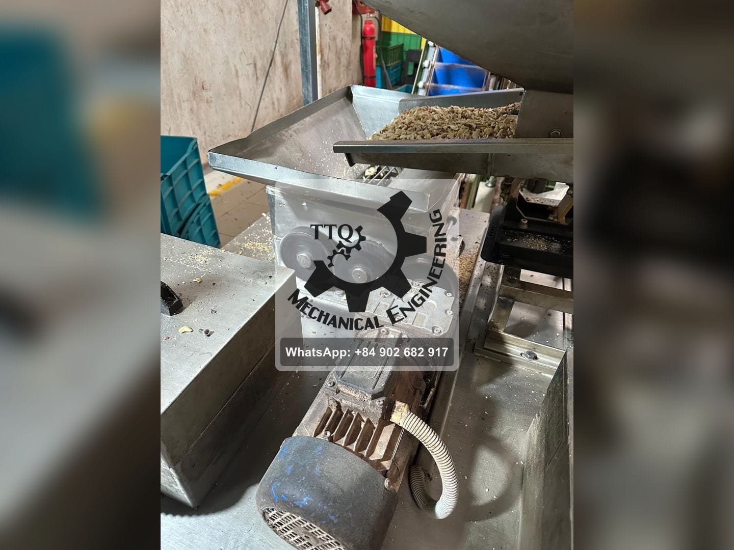 A TTQ dicing machine running, geared motor and belt drive, diced kernel on the discharge tray